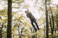 Teenage boy on a Rope Swing