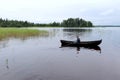 16 year old boy rowing a boat in Lake Saimaa, Finland Royalty Free Stock Photo