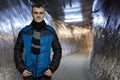 Teenage boy in a salt mine tunnel Royalty Free Stock Photo