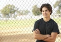 Teenage Boy Sitting In Playground Royalty Free Stock Photo