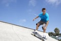 Teenage Boy In Skateboard Park