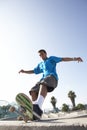 Teenage Boy In Skateboard Park