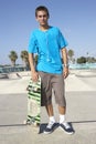 Teenage Boy In Skateboard Park Royalty Free Stock Photo