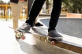 Teenage boy skateboarding outdoors Royalty Free Stock Photo