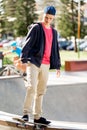 Teenage boy skateboarding outdoors Royalty Free Stock Photo