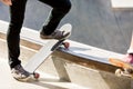 Teenage boy skateboarding outdoors Royalty Free Stock Photo