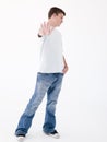 Teenage boy standing with hand up Royalty Free Stock Photo