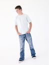 Teenage boy standing with hands in pockets Royalty Free Stock Photo