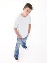 Teenage boy standing with hands in pockets Royalty Free Stock Photo