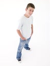 Teenage boy standing with hands in pockets Royalty Free Stock Photo