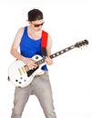 Teenage Boy with Sunglasses Playing Electric Guitar Royalty Free Stock Photo