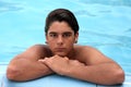 Teenage boy in swimming pool Royalty Free Stock Photo