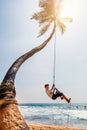 Teenage boy swinging Royalty Free Stock Photo