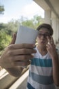 Teenage boy taking a selfie Royalty Free Stock Photo