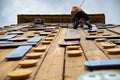 Teenage boy training on climbing wall, bottom view. (Palestra) Royalty Free Stock Photo
