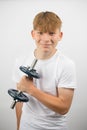 Teenage boy using a dumbbell Royalty Free Stock Photo