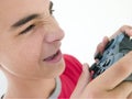 Teenage boy using video game controller Royalty Free Stock Photo