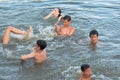 Teenage boys and girls having fun in the water Royalty Free Stock Photo