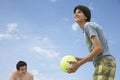 Teenage Boys Playing Beach Volleyball Royalty Free Stock Photo