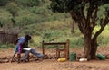 Teenage boys studying outdoors, Mozambique