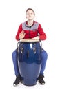 Teenage caucasian boy plays the conga in studio Royalty Free Stock Photo