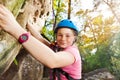 Teenage climber training on a very difficult route