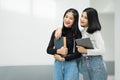 Teenage college friend students walking and chatting in college campus while having break after class. Two happy students walking Royalty Free Stock Photo