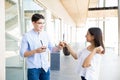 Couple Enjoying Loving Moment With Icecreams In Shopping Mall