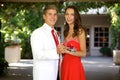 Teenage Couple Going to the Prom Posing and Smiling at Each Other