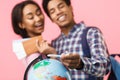 Teenage couple planning and preparing for journey Royalty Free Stock Photo