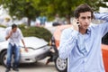 Teenage Driver Making Phone Call After Traffic Accident Royalty Free Stock Photo