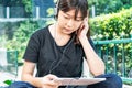 Teenage female learning to the music from a digital tablet