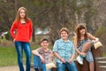 Teenage friends having fun in the park Royalty Free Stock Photo