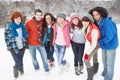 Teenage Friends Having Fun In Snow Royalty Free Stock Photo