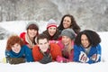 Teenage Friends Having Fun In Snow