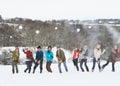 Teenage Friends Having Fun In Snowy Landscape Royalty Free Stock Photo