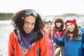 Teenage Friends Having Fun In Snowy Landscape Royalty Free Stock Photo