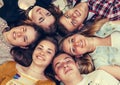 Teenage friends lying together in circle Royalty Free Stock Photo