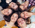 Teenage friends lying together in circle Royalty Free Stock Photo