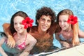 Teenage friends in a swimming pool Royalty Free Stock Photo