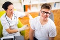 Teenage getting vaccination in his arm Royalty Free Stock Photo