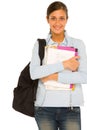 Teenage girl with backpack and books Royalty Free Stock Photo