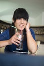 A teenage girl in the bar Royalty Free Stock Photo