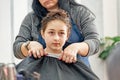 Teenage girl in a beauty salon on hair coloring and a haircut. Beauty concept. haircut, coloring