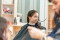 Teenage girl in a beauty salon on hair coloring and a haircut. Beauty concept. haircut, coloring Royalty Free Stock Photo