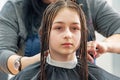 Teenage girl in a beauty salon on hair coloring and a haircut. Beauty concept. haircut, coloring