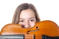 Teenage girl behind violin Royalty Free Stock Photo