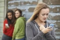 Teenage Girl Being Bullied By Text Message