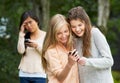 Teenage Girl Being Bullied By Text Message On Mobile Phone Royalty Free Stock Photo