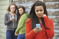 Teenage Girl Being Bullied By Text Message